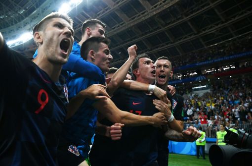 Im Überschwang der Freude fielen die Kroaten über die Fotografen,... Foto: Getty Images Europe